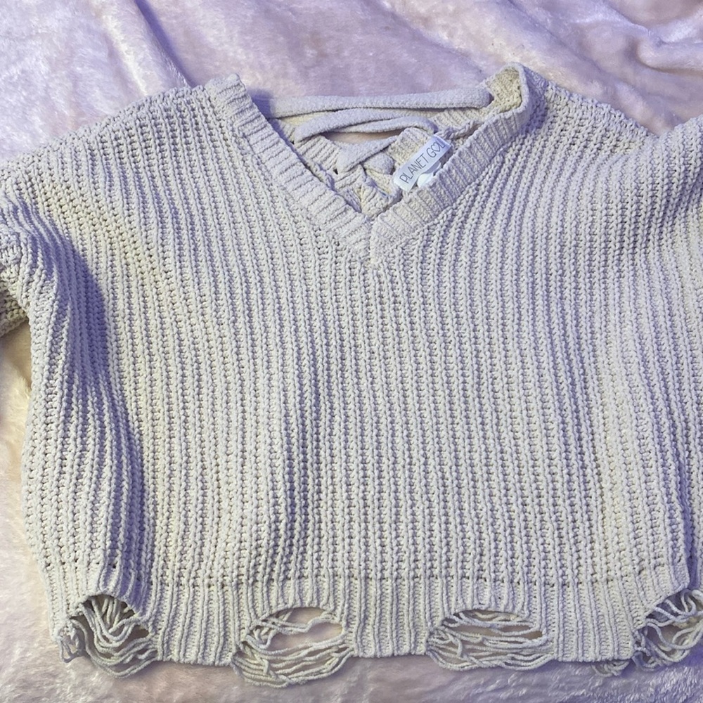 Cream color, Size medium brand is Planet Gold